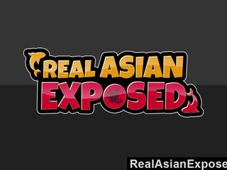 Realasianexposed mesi võtab a riist sisse a