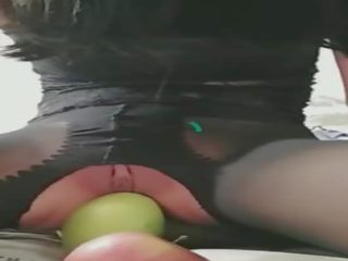 Adorable lover Puts the Fruit into the Hole