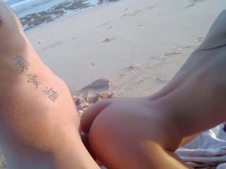 Public Beach dirty movie with swell Asian babe in 4K, Full Length